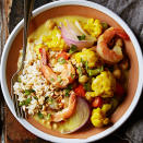 <p>In this delicious main dish, cauliflower is slow-cooked with curry powder and aromatic vegetables, and shrimp and chickpeas are added in towards the end of the cooking time. Served over brown basmati rice and sprinkled with cilantro and peanuts, this dish will get a thumbs up from anyone eating it! <a href="https://www.eatingwell.com/recipe/266703/curried-shrimp-with-cauliflower-and-chickpeas/" rel="nofollow noopener" target="_blank" data-ylk="slk:View Recipe;elm:context_link;itc:0;sec:content-canvas" class="link ">View Recipe</a></p>