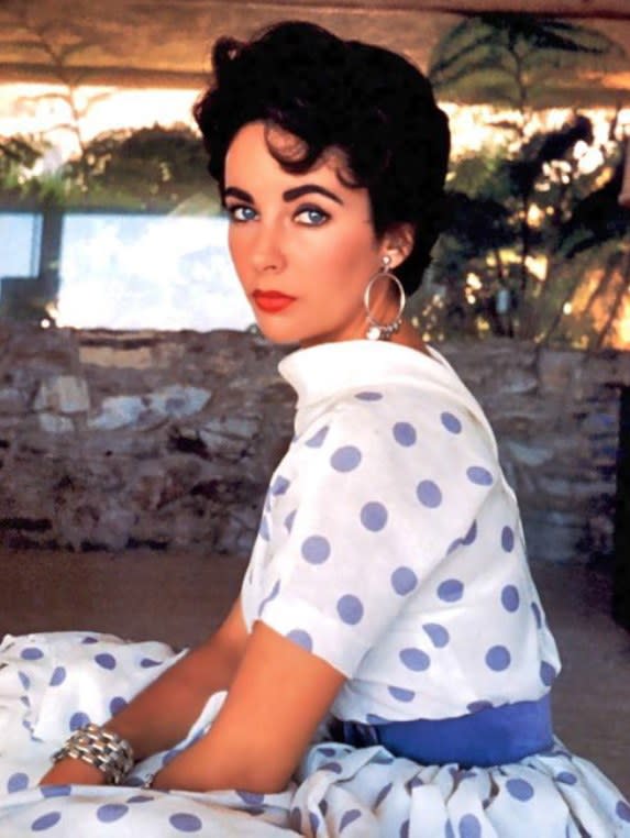 <h1 class="title">Elizabeth Taylor</h1><cite class="credit">Photo: Getty Images</cite>