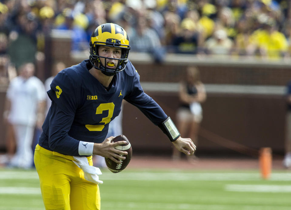 Michigan quarterback Wilton Speight (3) scrambles looking for a receiver in the third quarter of an NCAA college football game against Air Force in Ann Arbor, Mich., Saturday, Sept. 16, 2017. Michigan won 29-13. (AP Photo/Tony Ding)