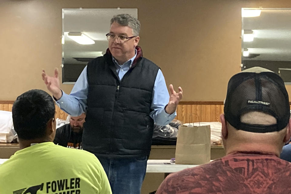 Wisconsin U.S. House candidate Brad Pfaff, a Democrat, speaks at a labor union meeting in Bangor, Wis., Oct. 11, 2022. Pfaff is trying to make Republican Derrick Van Orden’s attendance at the protests in Washington, D.C., on Jan. 6, 2021, the defining issue in Wisconsin’s 3rd District race, though it is gaining little traction in the closing weeks of the campaign. (AP Photo/Thomas Beaumont)