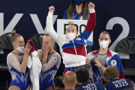 Russian Olympic Committee's artistic gymnastics women's team, from left, Liliia Akhaimova, Angelina Melnikova, Viktoriia Listunova and Vladislava Urazova celebrate after winning the gold medal at the 2020 Summer Olympics, Tuesday, July 27, 2021, in Tokyo. (AP Photo/Natacha Pisarenko)