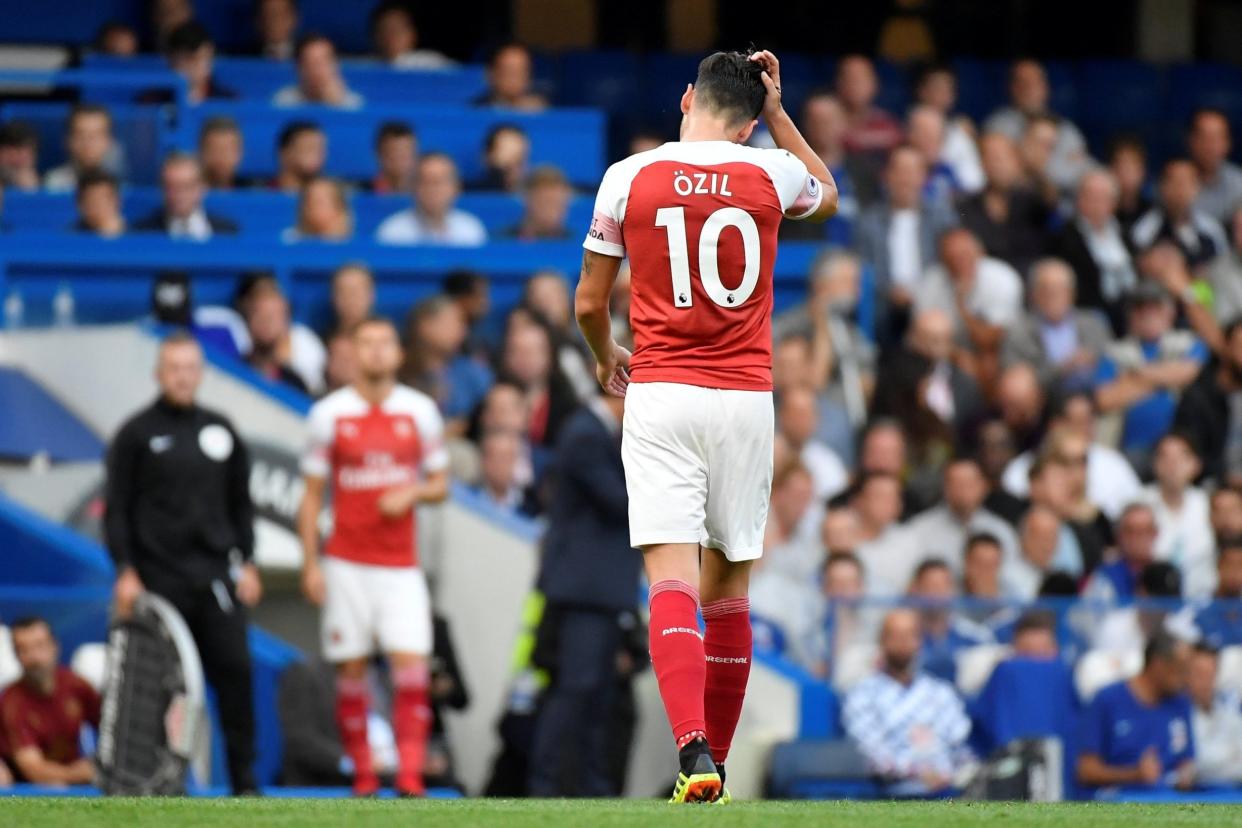 Come in No10: Mesut Ozil was taken off with 22 minutes remaining at Chelsea: REUTERS