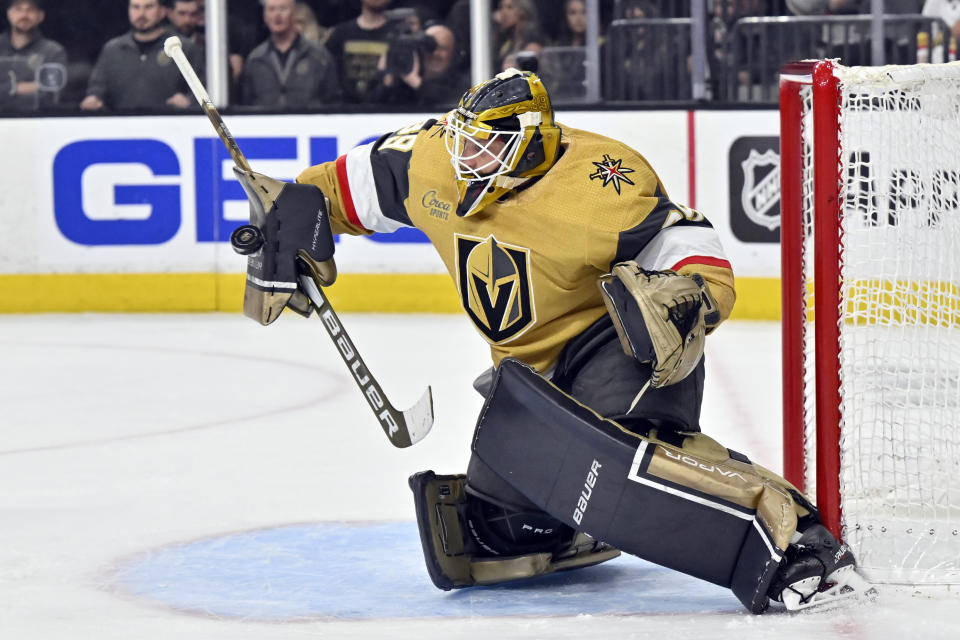 Vegas Golden Knights goaltender Laurent Brossoit makes a save against the Winnipeg Jets during the third period of Game 5 of an NHL hockey Stanley Cup first-round playoff series Thursday, April 27, 2023, in Las Vegas. (AP Photo/David Becker)