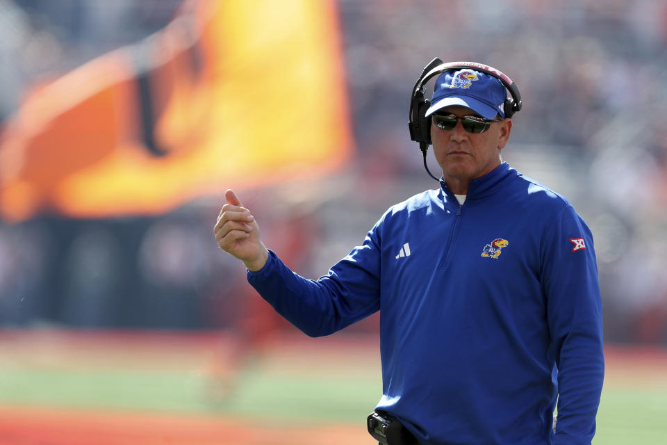 Kansas's Lance Leipold reacts on the sidelines during the first half of an NCAA college football against Oklahoma State game in Stillwater, Okla., Saturday, Oct. 14, 2023. (AP Photo/Mitch Alcala)