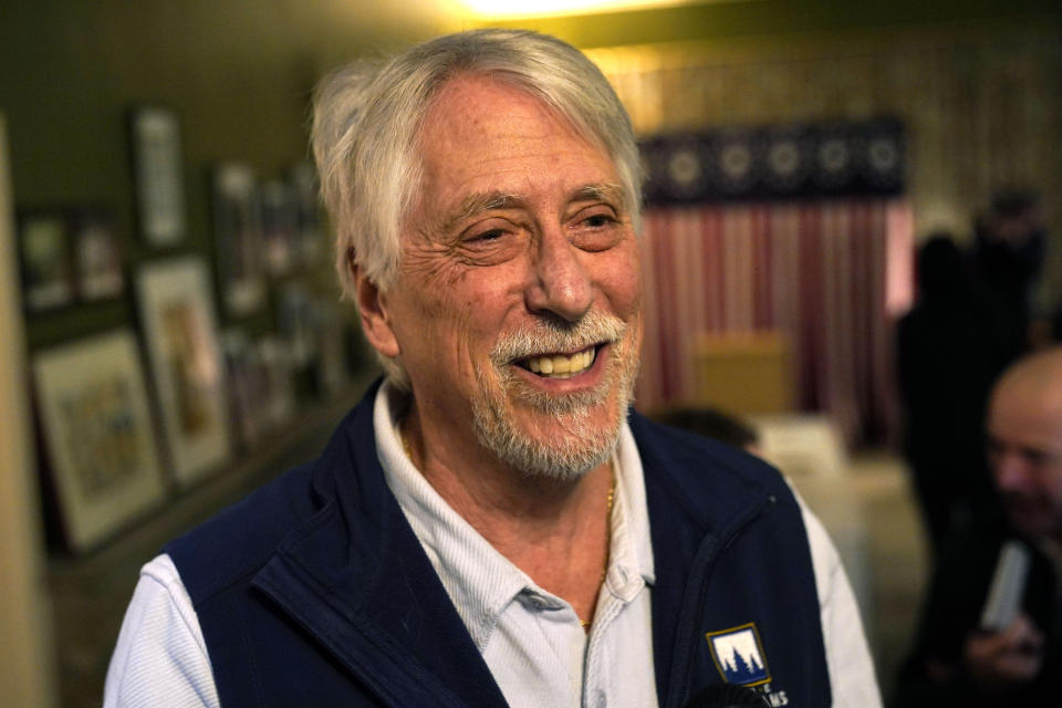 Leslie Otten, developer of The Balsams Resort, speaks to a reporter, Monday, Jan. 22, 2024, in Dixville Notch, N.H. Otten and five other voters will cast their ballots at midnight in the presidential primary election. (AP Photo/Robert F. Bukaty)