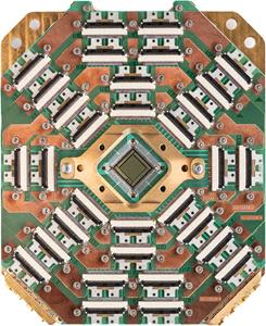 Photo of The D-Wave Advantage chip holder and 5,000 qubit chip.