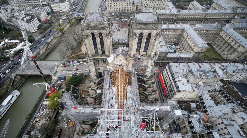While many elements of the building's reconstruction will remain true to the original, President Macron is also keen for elements of the landmark to "mark" the 21st century. - Christophe Ena/Pool/AFP/Getty Images