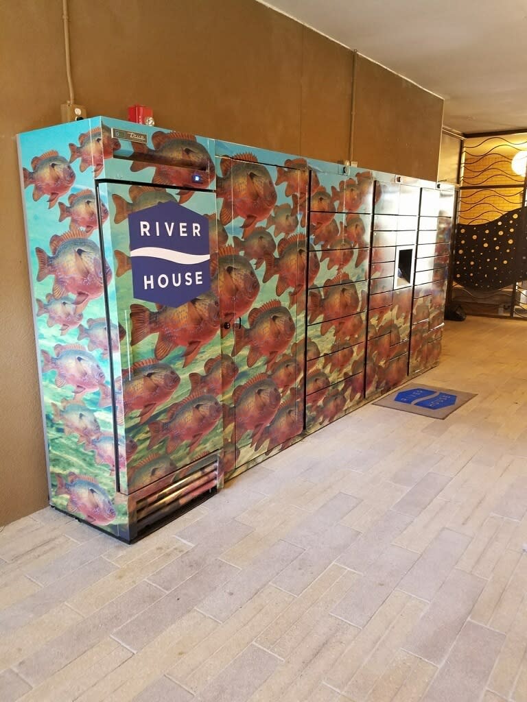 This photo provided by Luxer One shows one of Luxer's access lockers for packages and refrigerated systems for perishable deliveries at River House Apartments in San Antonio, Texas. Luxer One provides secure lockers in buildings in the United States and Canada that can be accessed by both delivery companies and residents.(Luxer One via AP)