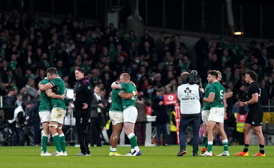 Ireland celebrate their third victory in five Tests against the All Blacks (PA)