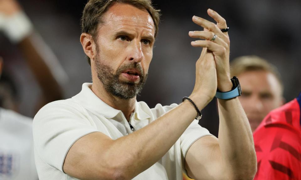 <span>Gareth Southgate applauds the fans at the end of the 0-0 draw against Slovenia despite being given a hostile reception.</span><span>Photograph: Richard Sellers/Getty Images/Allstar</span>