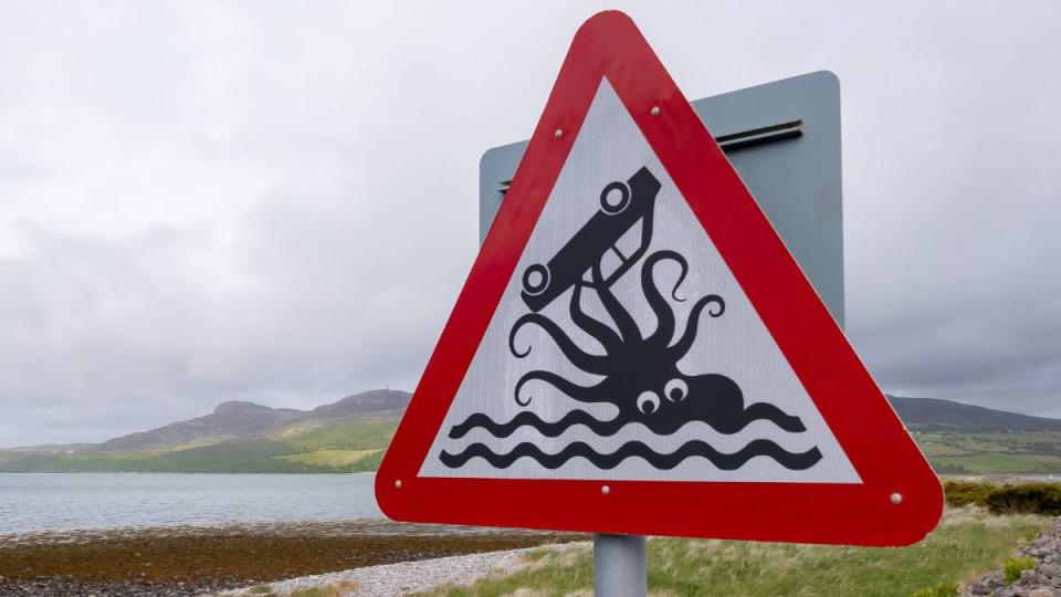 A humorous road sign beside a causeway near the coastal village of Tongue in the northwest of Scotland. (Funny road signs )