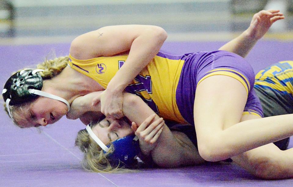 Watertown's Olivia Anderson attempts to pin Aberdeen Central's Avery Bendewald at 106 pounds during an Eastern South Dakota Conference wrestling triangular on Thursday, Jan. 26, 2023 in the Watertown Civic Arena.
