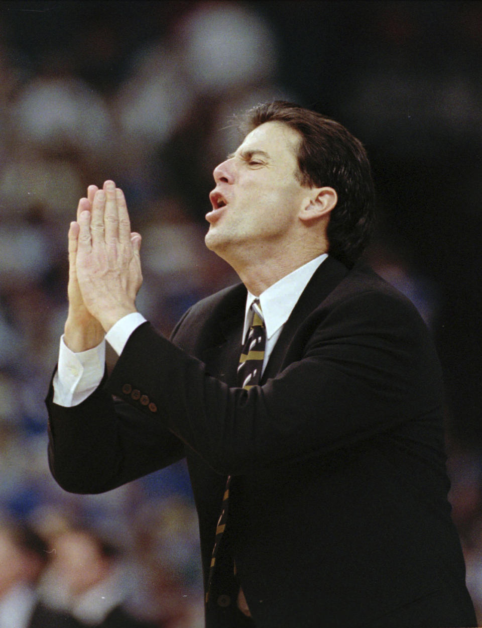 FILE - Kentucky coach Rick Pitino pleads with his players during the closing minutes of their 84-73 loss to Mississippi State in the finals of the NCAA college basketball Southeastern Conference Tournament at the Louisiana Superdome in New Orleans, Sunday March 10, 1996. (AP Photo/Ed Reinke, File)