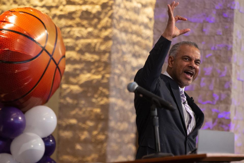 Jerome Tang, Kansas State’s new men’s basketball coach, forms a Powercat with his hands Thursday, March 24, 2022, during his introduction press conference.