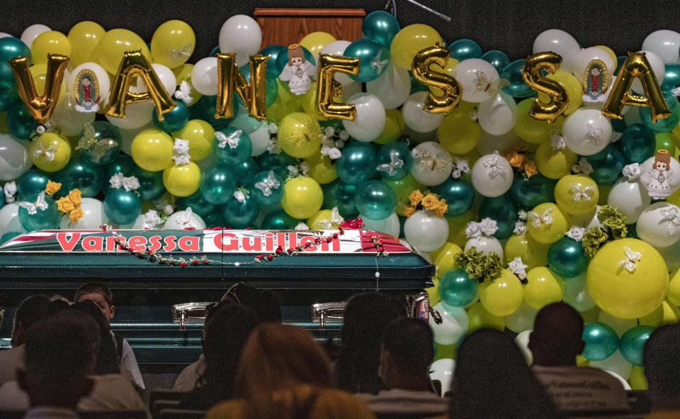 The casket of Army Spc. Vanessa Guillen is viewed at a public memorial service on Friday, Aug. 14, 2020, in Houston. Guillen, who was last seen on April 22, was laid to rest nearly four months after she is said to have been killed by a fellow soldier at Fort Hood, a U.S. Army base in Texas. Mourners gathered at Cesar Chavez High School where Guillen grew up playing soccer and dreaming of joining the military. (Marie D. De Jesus/Houston Chronicle via AP, Pool)