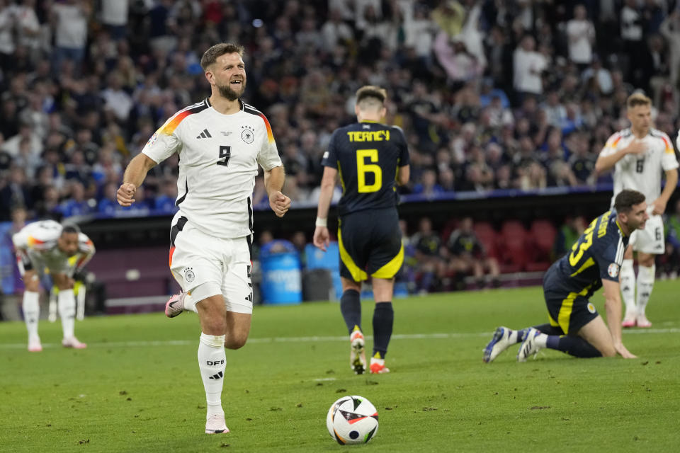 Nickas Füllkrug, de Alemania, festeja tras anotar el cuarto tanto de su selección ante Escocia, en la inauguración de la Eurocopa, el viernes 14 de junio de 2024 (AP Foto/Antonio Calanni)