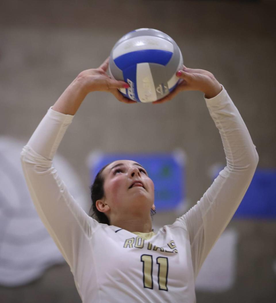 Ella Blair sets the ball for the Royals. Cowitz Gymnasium at Mission Prep was full and loud as the San Luis Obispo Tigers girls volleyball team beat the Royals 3-0 Sept. 26, 2023.