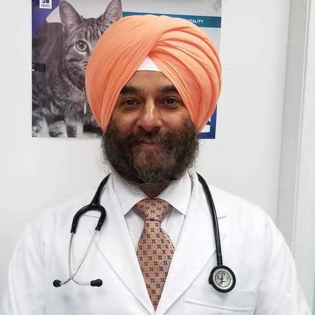 Dr. Bhupinder Johar, owner of the Haney Animal Hospital in Abbotsford, B.C., is the lead complainant in a new discrimination case against the College of Veterinarians of B.C. (Facebook/Haney Animal Hospital - image credit)