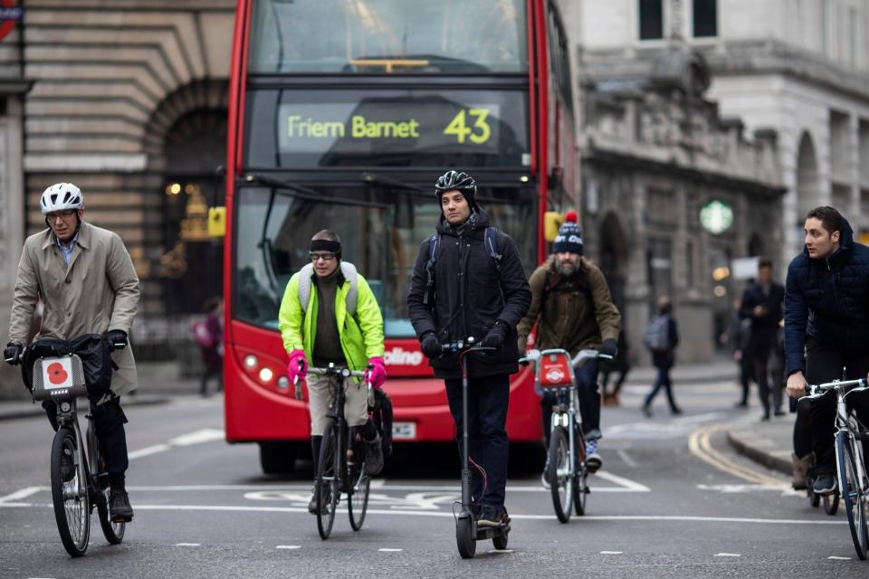 Despite being banned on roads, e-scooters have become more of a common sight mixing with bicycles and vehicles in the capital (Getty Images)