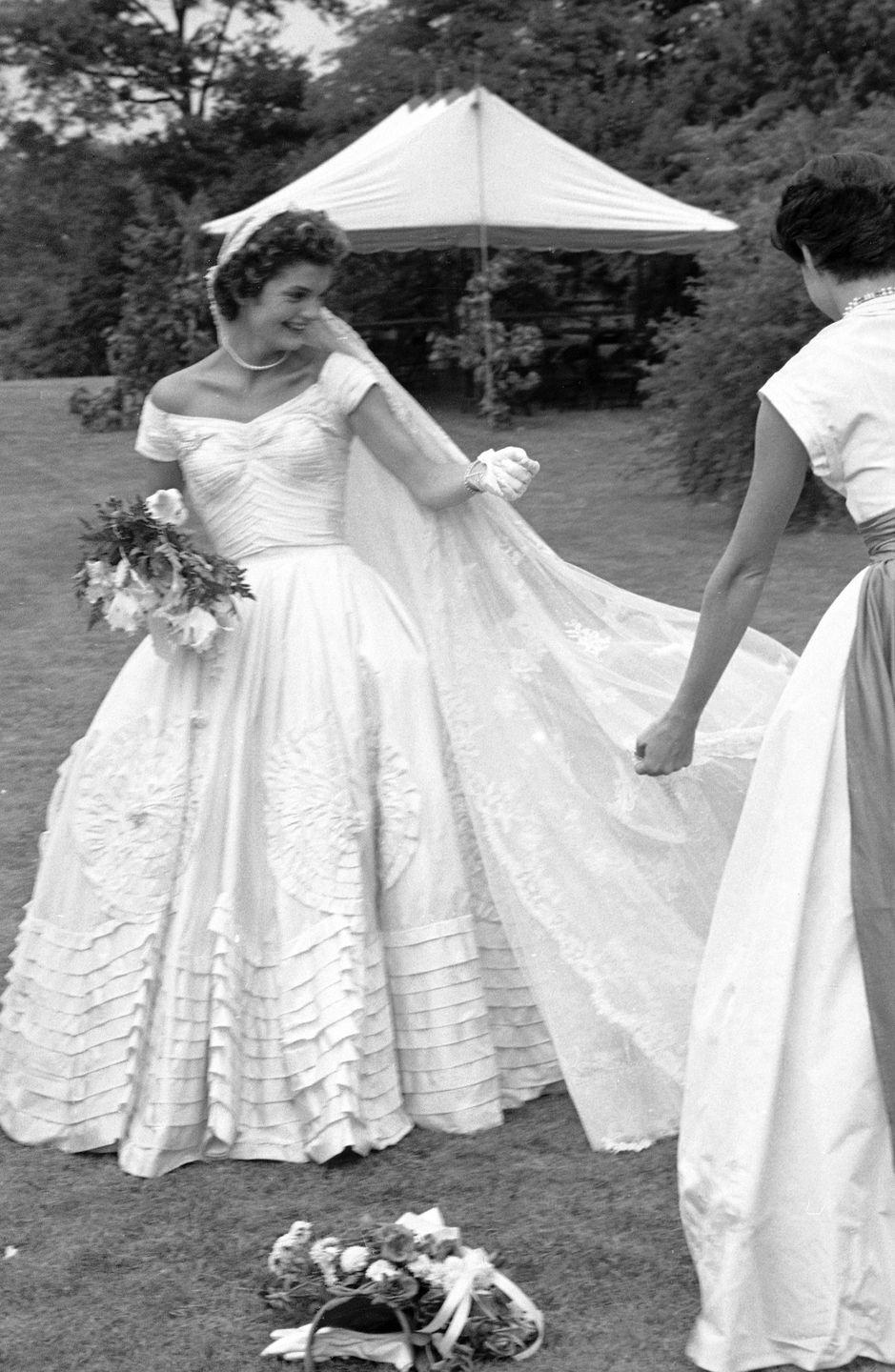 <p>Unfortunately, Jackie's first dress got destroyed in an unexpected flood <a href="https://www.brides.com/story/jackie-kennedy-jfk-wedding-photos" rel="nofollow noopener" target="_blank" data-ylk="slk:when a pipe burst;elm:context_link;itc:0;sec:content-canvas" class="link ">when a pipe burst</a> in Ann's New York City studio, ruining Jackie's dress and the bridesmaid dresses. Jackie's first dress <a href="https://www.glamour.com/story/jackie-kennedy-wedding-dress-pictures" rel="nofollow noopener" target="_blank" data-ylk="slk:had taken eight weeks to make;elm:context_link;itc:0;sec:content-canvas" class="link ">had taken eight weeks to make</a>, and, to make matters worse, the incident occurred a mere 10 days before the ceremony. And so, Ann recruited a few staff members, and after working night and day constantly, ended up recreating the gorgeous gown by the time Jackie's big day had arrived.<br></p>