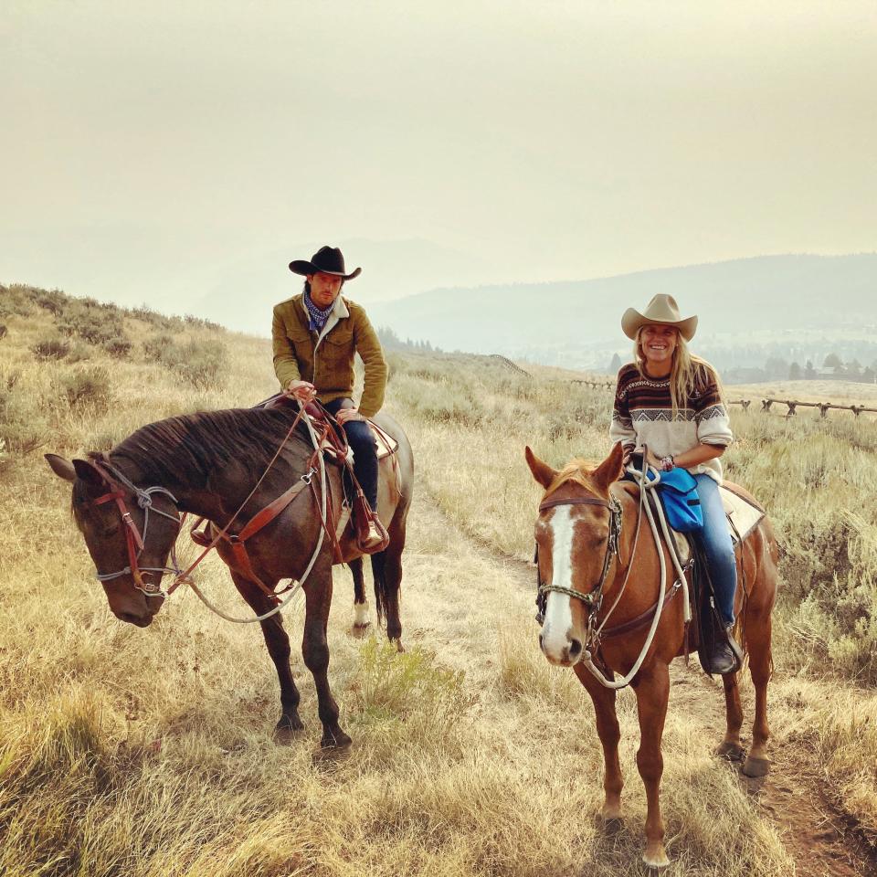 Authro and friend horseback riding