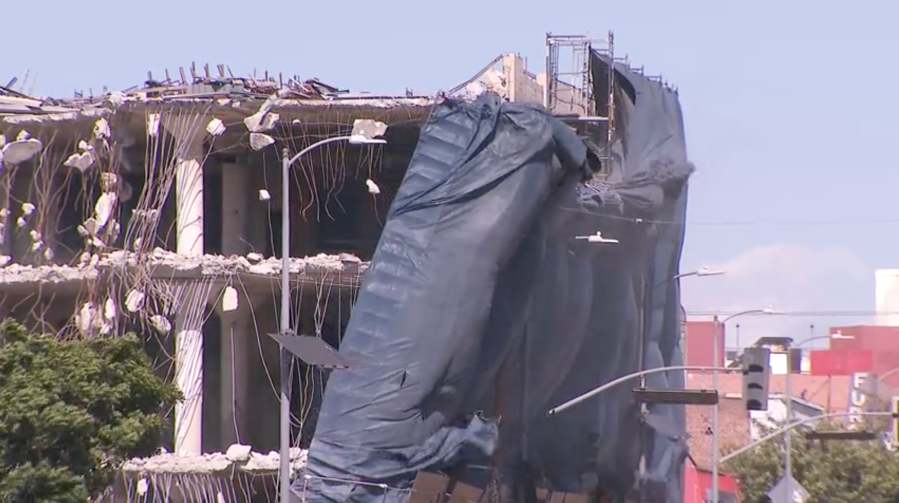 Scaffolding in Hollywood was impacted by gusty winds in Southern California. The Los Angeles Fire Department was on the scene after the scaffolding fell onto nearby power lines on May 5, 2024. (KTLA)