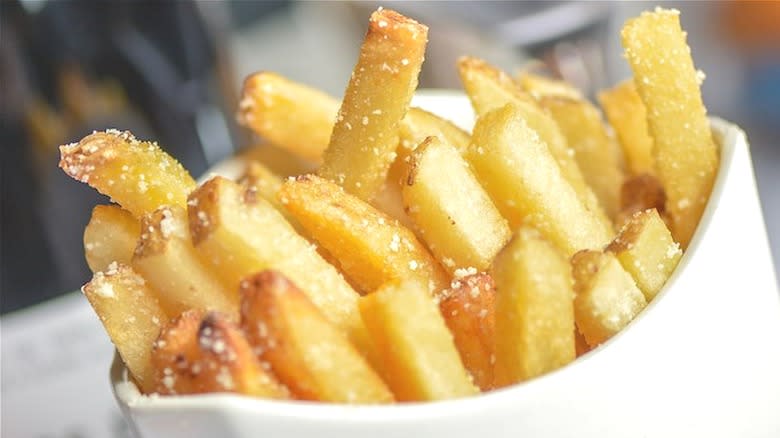 Salted french fries in cup