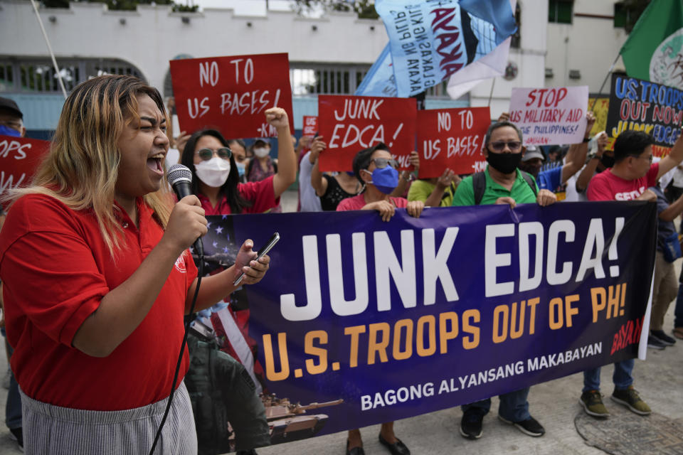 Demonstrators shout slogans as they protest against the visit of U.S. Defense Secretary Lloyd Austin outside Camp Aguinaldo military headquarters in metro Manila, Philippines on Thursday, Feb. 2, 2023. Austin is in the Philippines for talks about deploying U.S. forces and weapons in more Philippine military camps to ramp up deterrence against China's increasingly aggressive actions toward Taiwan and in the disputed South China Sea. (AP Photo/Aaron Favila)
