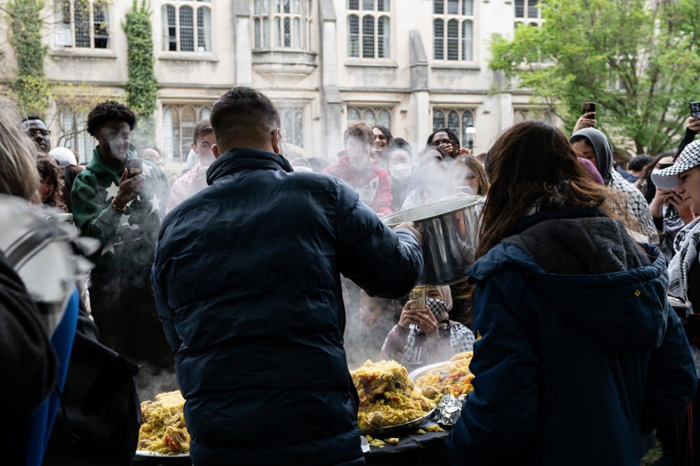 <em>Maqlubah</em>, a traditional Palestinian rice dish, is served at the Princeton “Gaza Solidarity Encampment” on April 28.<span class="copyright">Calvin Kenjiro Grover for The Daily Princetonian</span>