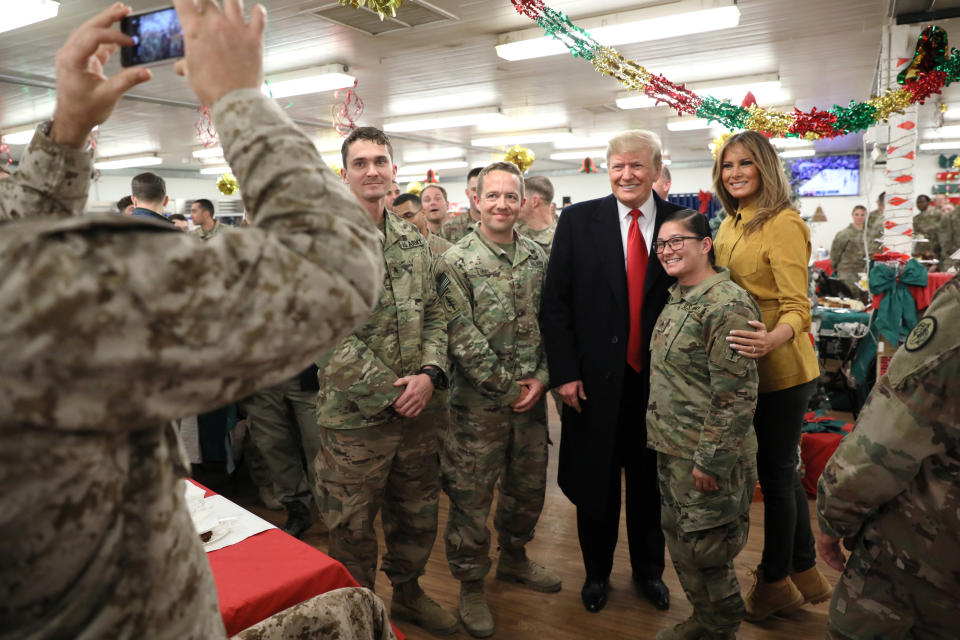 President Trump and first lady Melania Trump greet military personnel at the dining facility at Al Asad Air Base, Iraq, on Dec. 26, 2018. (Photo: Jonathan Ernst/Reuters)