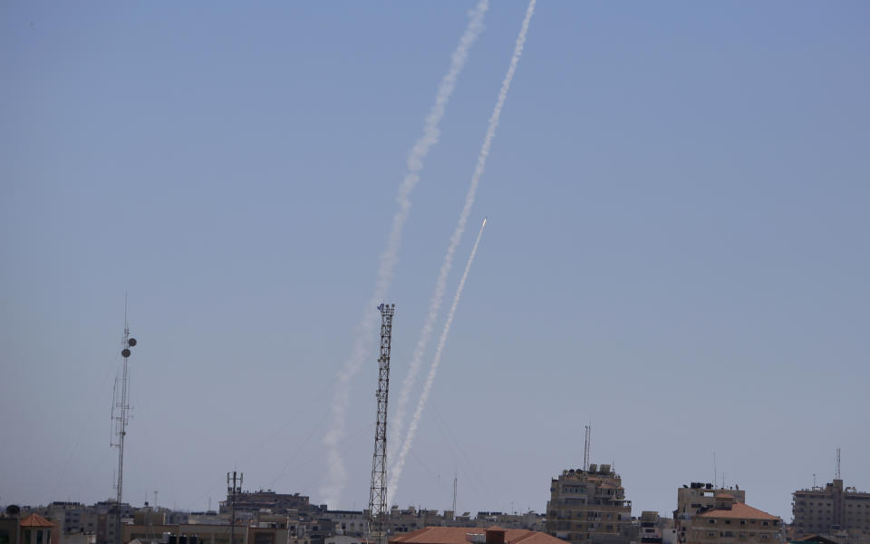 Rockets are launched from the Gaza Strip to Israel, Tuesday, May 18, 2021. Since the fighting began last week, the Israeli military has launched hundreds of airstrikes it says are targeting Hamas' militant infrastructure, while Palestinian militants have fired thousands of rockets into Israel. (AP Photo/Hatem Moussa)