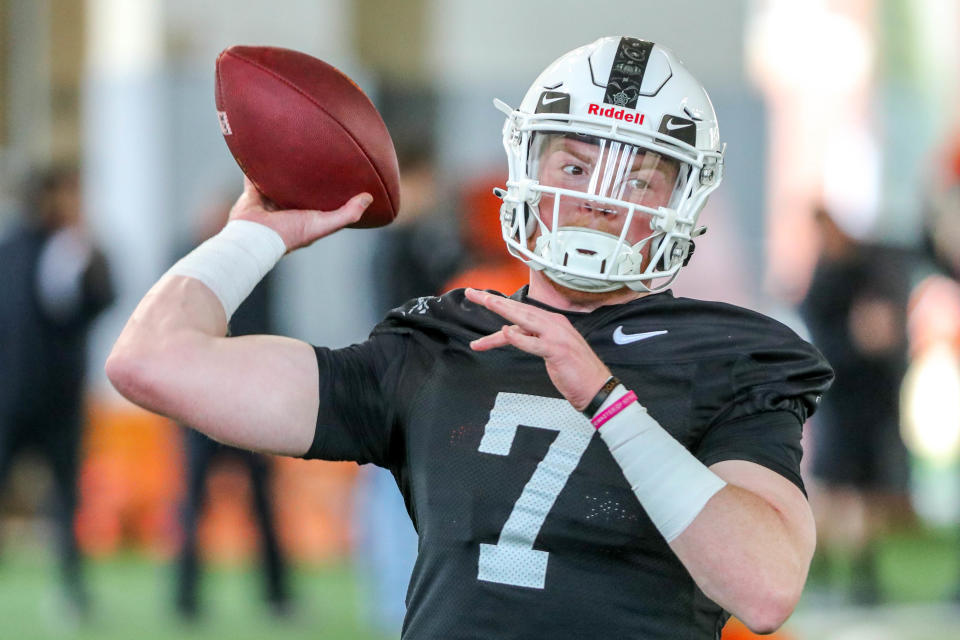 Quarterback Alan Bowman (7) runs drills during an Oklahoma State Spring football practice at Sherman E. Smith Training Center in Stillwater, Okla., Tuesday, March 21, 2023.