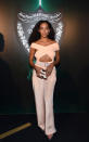 <p>Solange was positively smoldering in this off-the-shoulder baby pink cutout jumpsuit from Cushnie et Ochs. Pink pointy pumps and a box clutch completed her look, and, yes, her tresses were, as they always are, completely on point. (<i>Photo: Getty)</i></p>