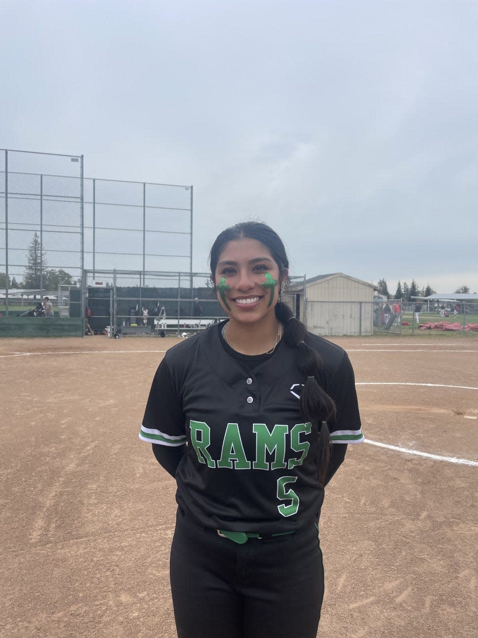 Ariel Nava, St. Mary's softball pitcher poses for a photo after Thursday's game against Lincoln at Lincoln High School.
