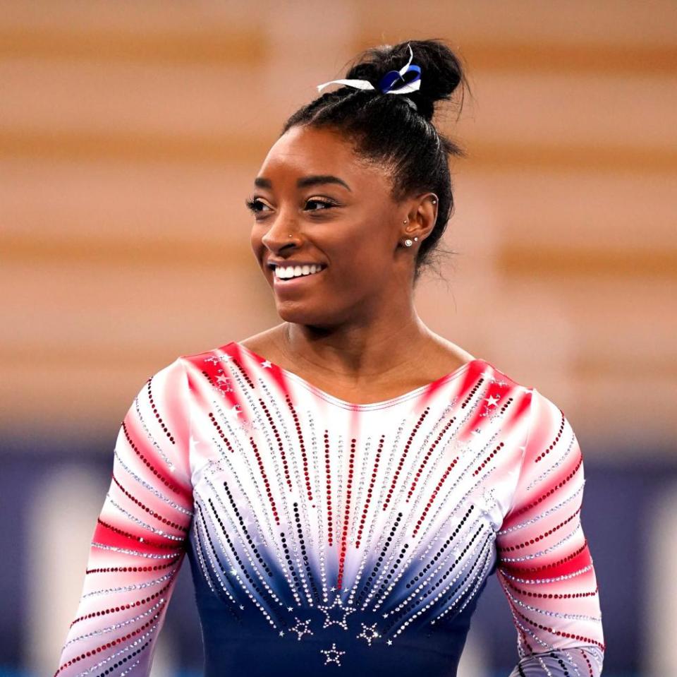 Simone Biles performs in the balance beam final at Toyko 2020