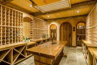 <p>If you’re a wine-lover, this home has a cellar that will meet all your needs. (Listing via <span>Re/Max</span>) </p>