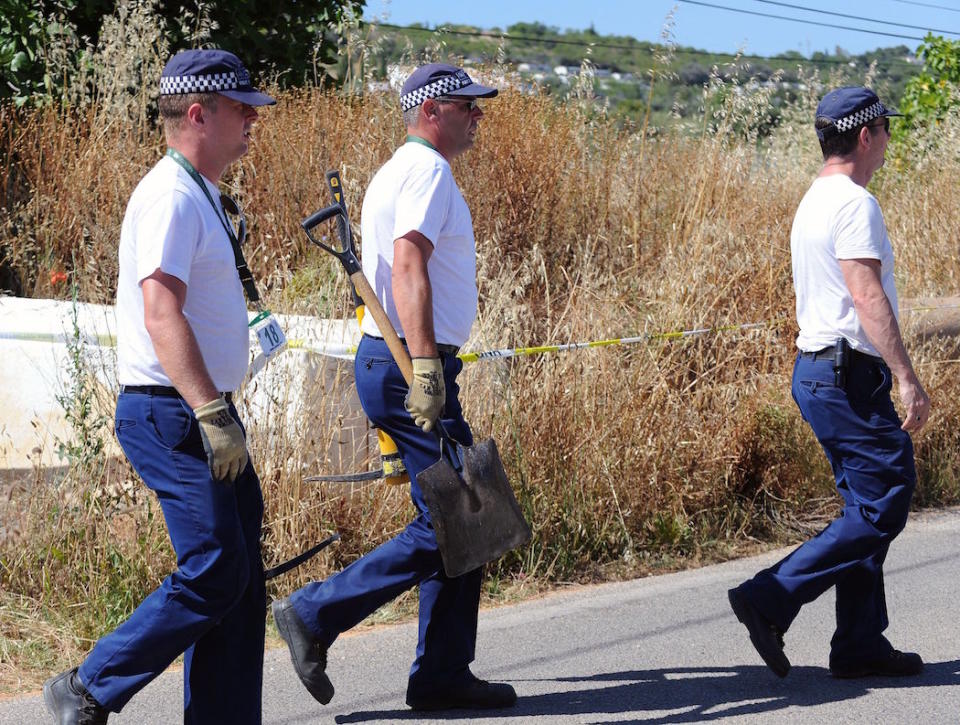 British police searching an area near Praia da Luz in 2014 (Picture: PA)