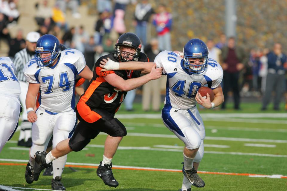 42853   Hasbrouck Heights, NJ  11/22/2007 At right, Marc Peck, of Wood-Ridge, tries to get away from Zach Ketcho, of Hasbrouck Heights.   Wood-Ridge Vs. Hasbrouck Heights Thanksgiving Football Game. Final score 21-0 Hasbrouck Heights.  Tariq Zehawi / The Record