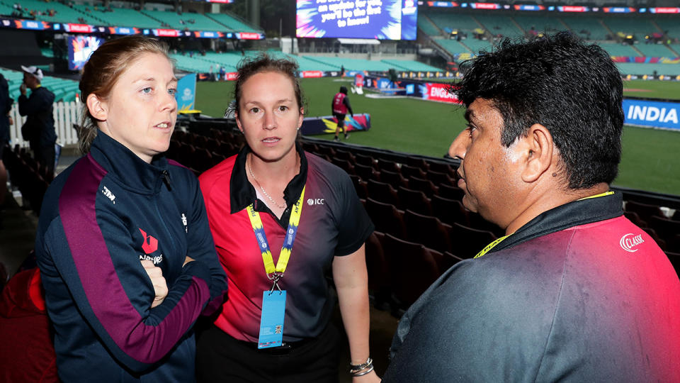 England captain Heather Knight, pictured here speaking to cricket officials at the SCG.