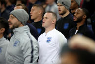 Rooney sings the national anthem (Nick Potts/PA)