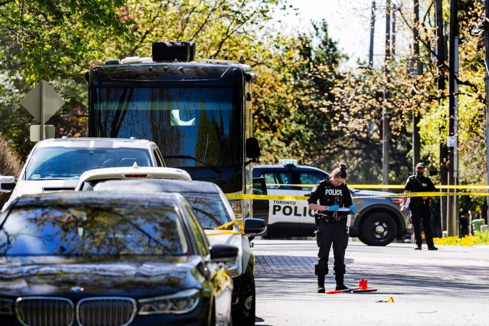 PHOTO: Toronto Police Service are seen outside Canadian entertainer Drake's Bridle Path neighbourhood mansion, May 7, 2024, in Toronto. (Andrew Francis Wallace/Toronto Star via Getty Images)