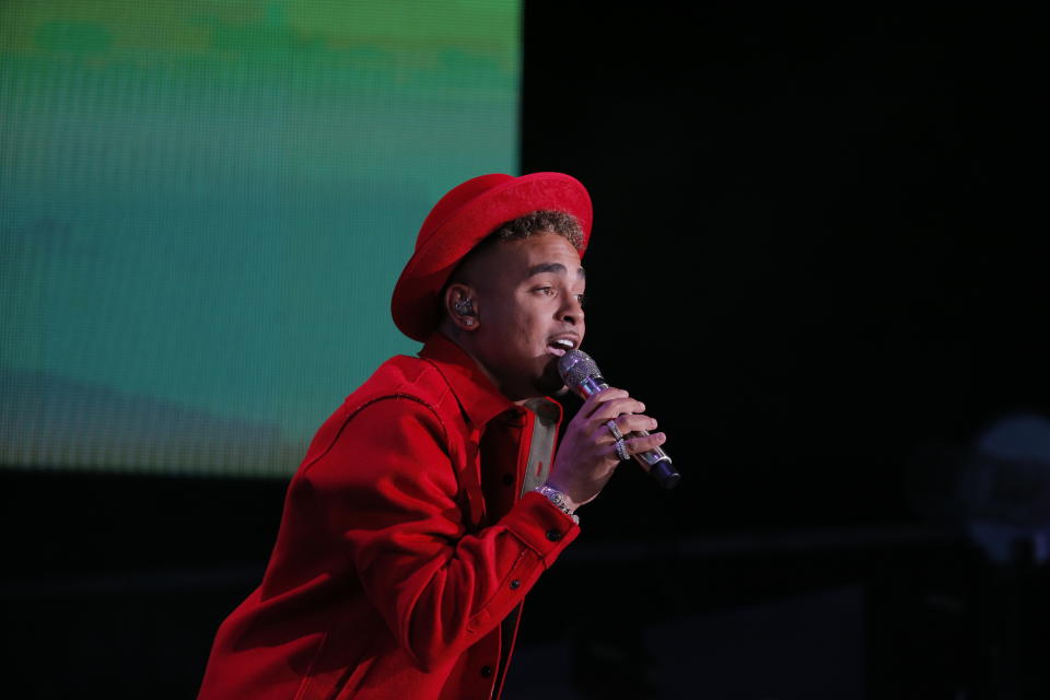 Singer Ozuna performs during the Coca-Cola Flow Reggaeton festival in Mexico City, Saturday, Nov. 23, 2019. (AP Photo/Ginnette Riquelme)