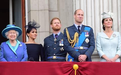 Queen Elizabeth II, Meghan Duchess of Sussex, Prince Harry Duke of Sussex, Prince William Duke of Cambridge and Katherine Duchess of Cambridge watch the RAF 100th anniversary flypast - Credit: PAUL GROVER FOR THE TELEGRAPH 