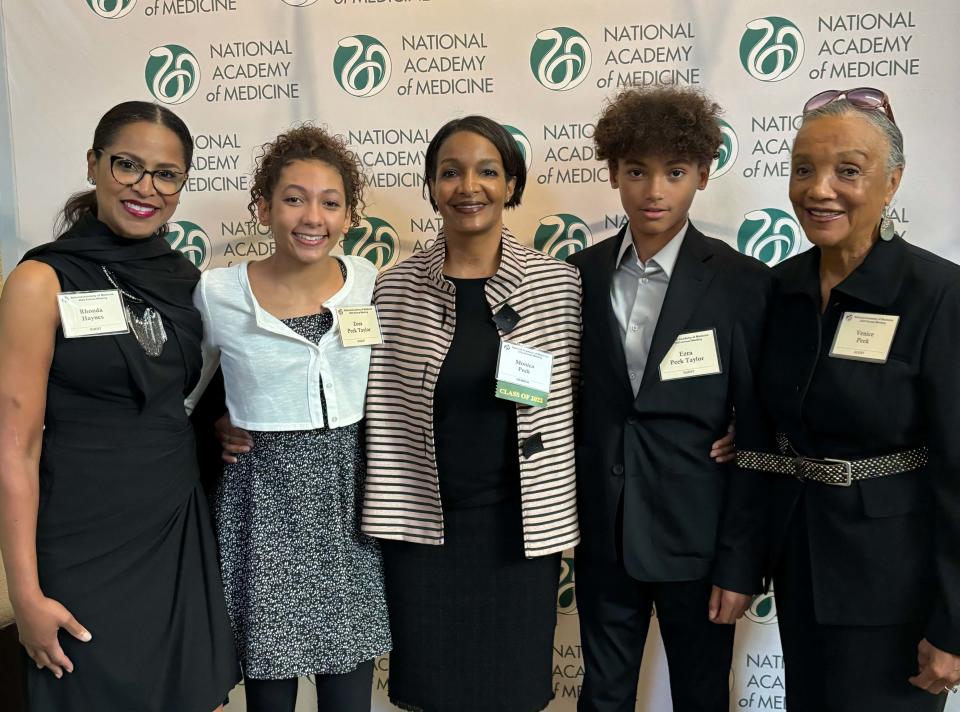 Dr. Monica Peek with her family at friends at the National Academy of Medicine induction reception. From left: Ronda Haynes, Zora Peek Taylor, Dr. Peek, Ezra Peek Taylor, and Venice Peek.