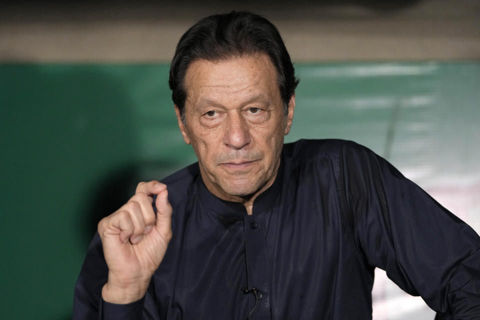 Pakistan's former Prime Minister Imran Khan gives a press conference at his home, in Lahore, Pakistan, Thursday, May 18, 2023. (AP Photo/K.M. Chaudary)