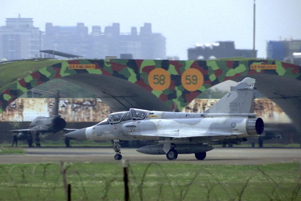 In this image made from video, a mirage fighter jet prepares to take off at an air base in Hsinchu, Taiwan, Thursday, April 6, 2023. Taiwan's Ministry of National Defense said Wednesday evening it had tracked China's Shandong aircraft carrier passing southeast of Taiwan through the Bashi Strait. On Thursday morning, it tracked three People's Liberation Army navy vessels and one warplane in the area around the island. (AP Photo/Johnson Lai)