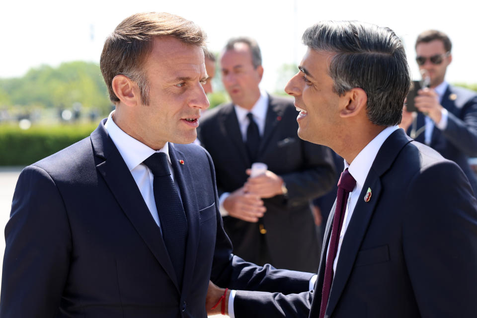 VER-SUR-MER, FRANCE - JUNE 06: President of France, Emmanuel Macron and Prime Minister of the United Kingdom Rishi Sunak attends the UK Ministry of Defence and the Royal British Legion’s commemorative event at the British Normandy Memorial to mark the 80th anniversary of D-Day on June 06, 2024 in Ver-Sur-Mer, France. Normandy is hosting various events across significant sites such as Pegasus Bridge, Sainte-Mère-Église, and Pointe du Hoc, to officially commemorate the 80th anniversary of the D-Day landings that took place on June 6, 1944. (Photo by Chris Jackson/Getty Images)