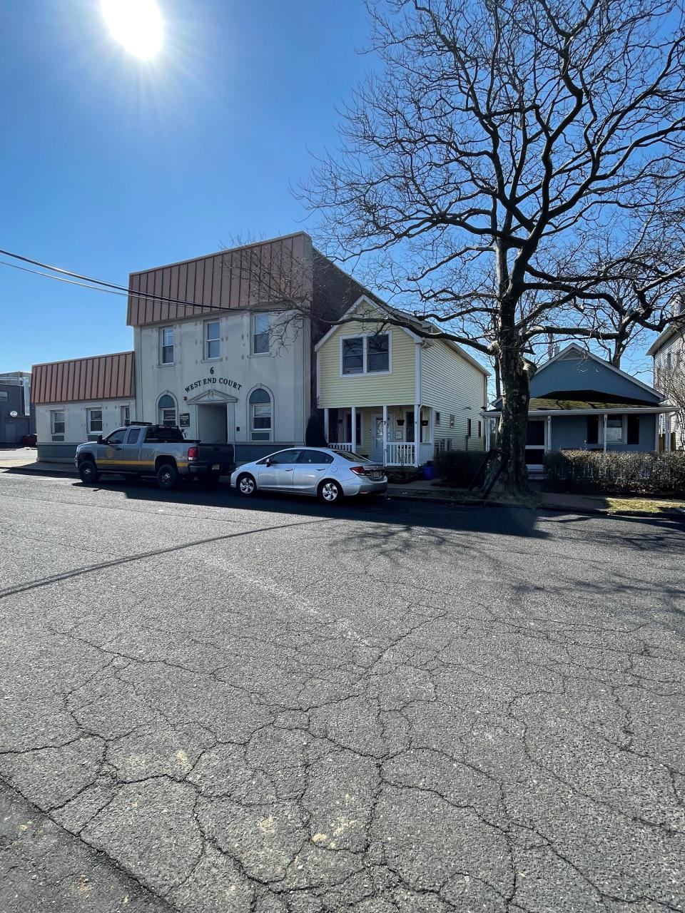 A proposed plan would tear down the building at 6 West End Court in Long Branch for a mixed-use residential building. The building is two doors down from 7 1/2 West Court, the bungalow that Bruce Springsteen stayed at when he wrote the album "Born to Run," seen here painted blue on March 18, 2022.