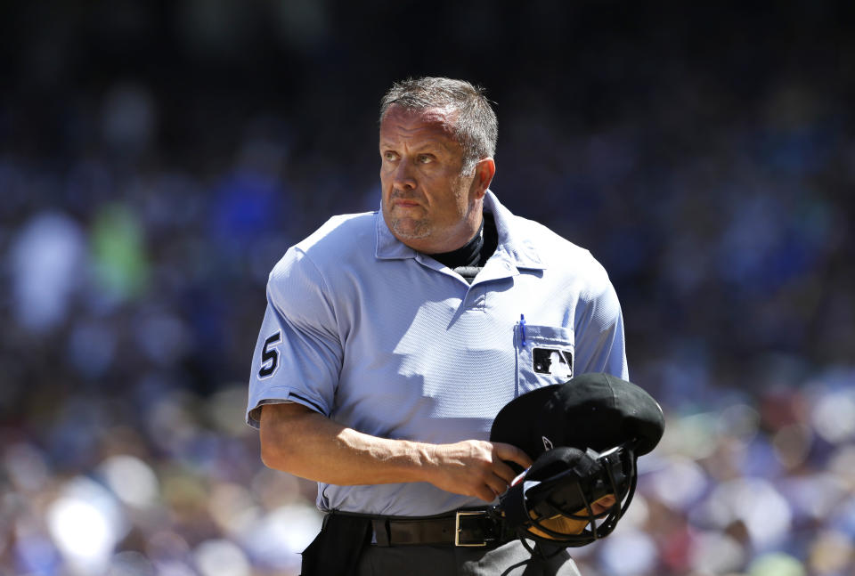 After over 30 years and over 3,500 games, umpire Dale Scott is retiring due to his concerns about concussions. (AP Photo)