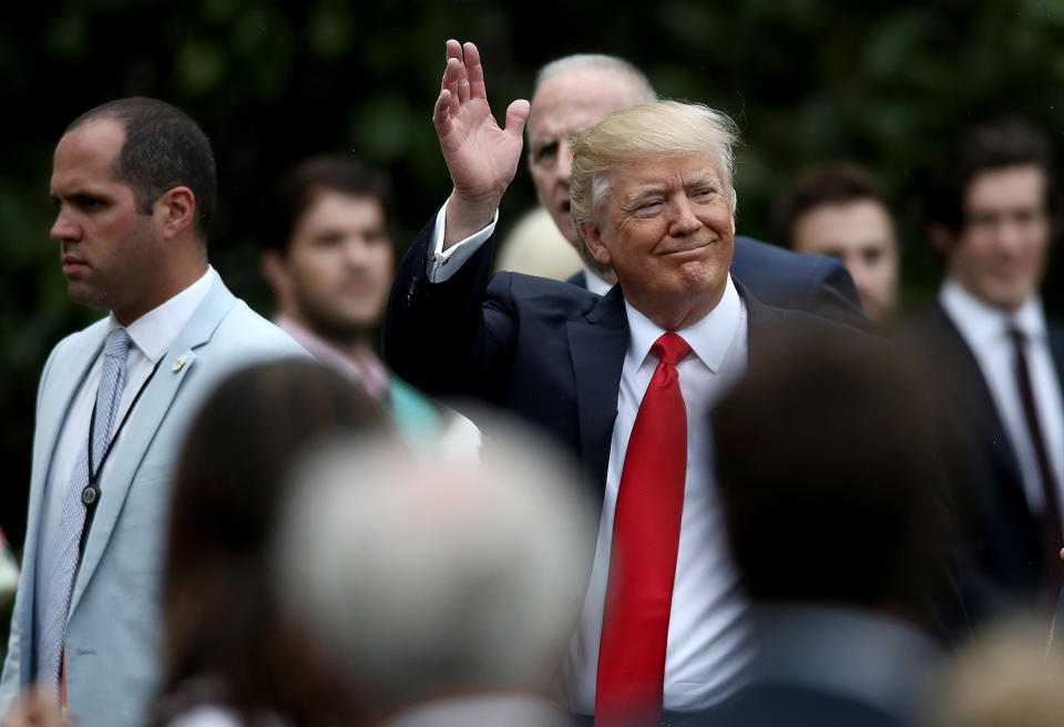 President Trump waves during White House Easter Egg Roll